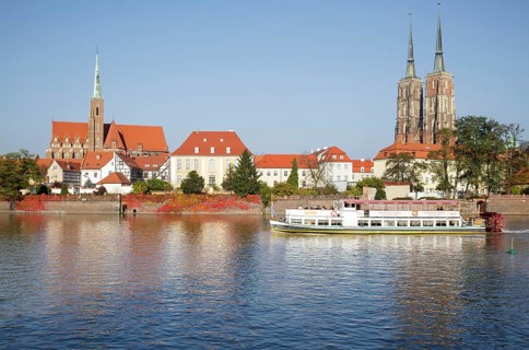 Cathedral Island Ostrow Tumski with tourist boat on the River Oder