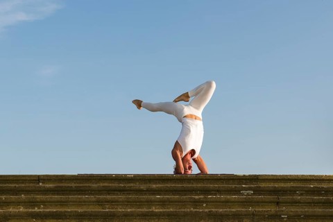 Young woman practising Hatha yoga