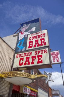 Advertising sign for Cowboy Bar