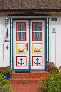Typical carved and painted door of a wood house