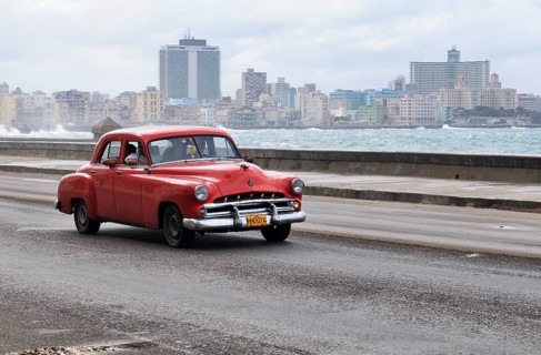 American vintage car travelling on the Malecon