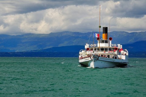 Paddle steamer Simplon on Lake Geneva or Lac Leman with storm clouds