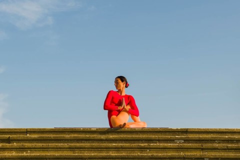 Young woman practising Hatha yoga