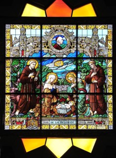Stained glass window above the main altar