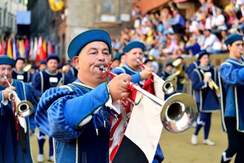 Festive parade before the historic horse race Palio di Siena