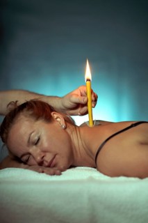 Woman being treated with a body candle