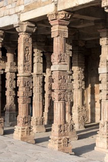 Columns with carvings at Quwwat ul-Islam Mosque