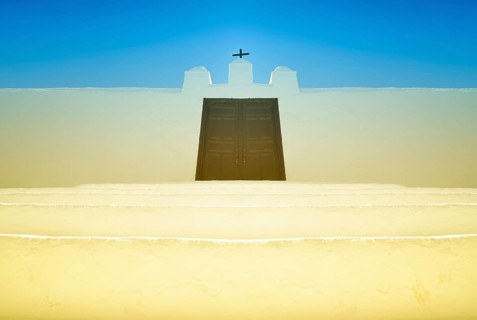 Entrance to a Spanish cemetery with a locked door