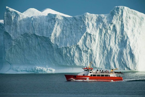Disko Line ferry passing iceberg