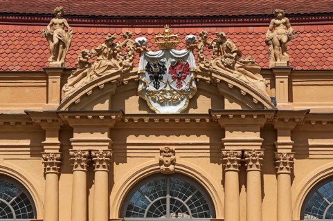 Alliance coat of arms of the margrave's builders surrounded by deities at the orangery in the castle grounds