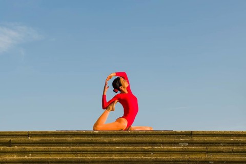 Young woman practising Hatha yoga