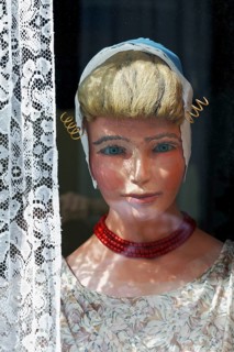 Display dummy in Dutch traditional costume in a window