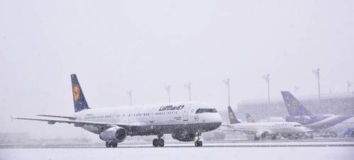 Lufthansa Airbus A321-200 aircraft rolling on the run during snowfall