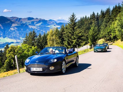 Aston Martin DB7 Vantage Volange cars on a mountain road near Kitzbuhel