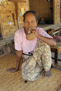 Burmese woman smoking a cheroot