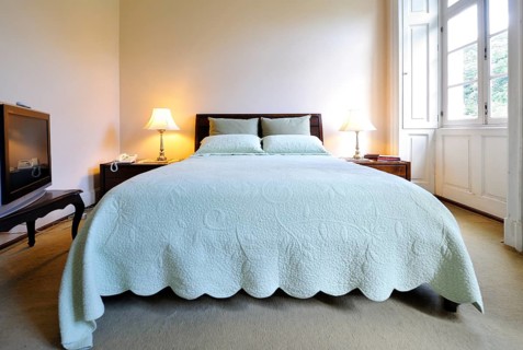 Double bed in a bedroom