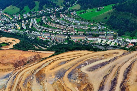 Open pit ore mining and workers' settlements