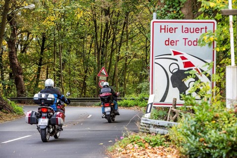 Danger sign for motorcyclists on a road in southern Essen