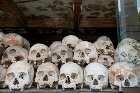 Skulls and bones in the Memorial Stupa to the prisoners murdered by the Communist or Maoist Khmer Rouge in Choeung Ek