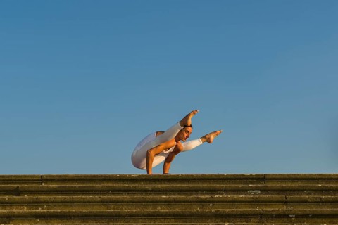 Young woman practising Hatha yoga