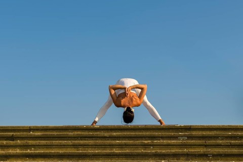 Young woman practising Hatha yoga