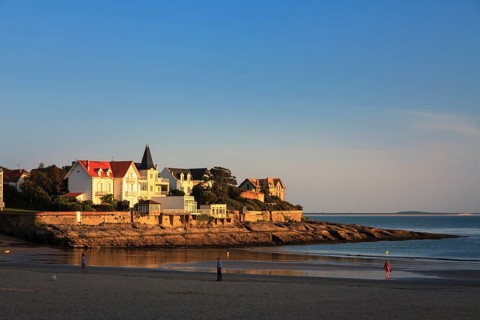 Houses by the sea in the evening light