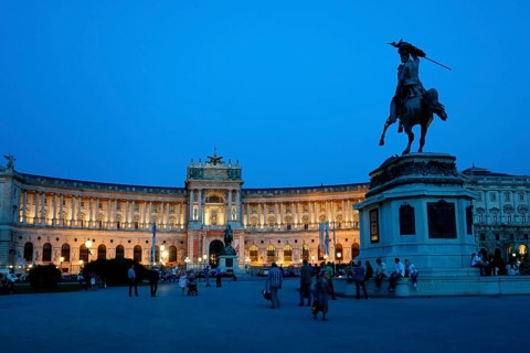Hofburg Palace at Heldenplatz square with the equestrian monument of Archduke Charles