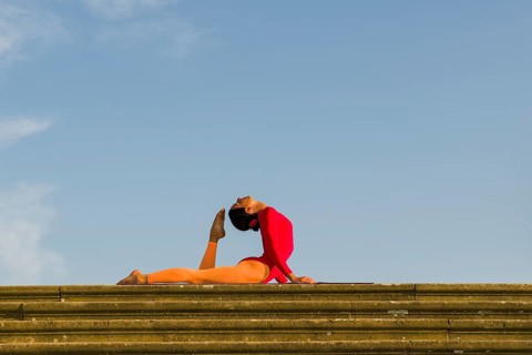 Young woman practising Hatha yoga
