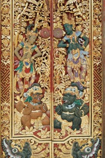 Wooden door decorated with carvings