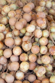 Longan fruits on display at a market