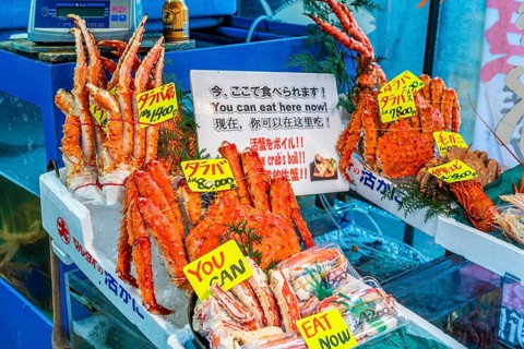 Prawns for sale and raw consumption at a market
