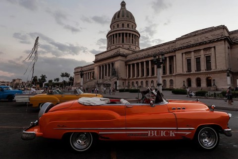 Vintage Buick from the 1950s in front of the Capitol at dusk