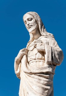 White Statue of Jesus Christ outside the Chapel of Virgen de la Pena