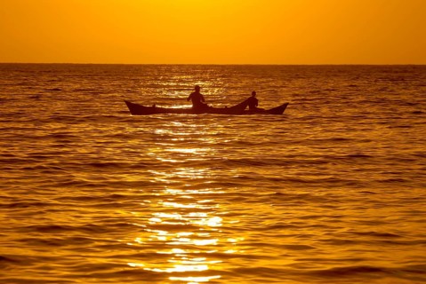Fishermen at sunset