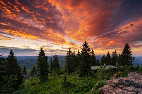 Dramatic cloud atmosphere at sunrise at the summit of the Grosser Rachel