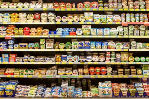 Refrigerated shelf with various dairy products
