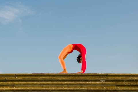 Young woman practising Hatha yoga