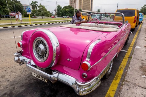 Pink convertible taxi