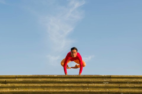 Young woman practising Hatha yoga