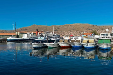 Boats in the harbour of Puno on Lake Titicaca