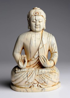 Old Buddha sculpture made of ivory