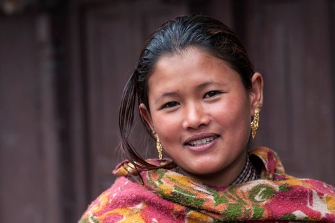 Young Nepali woman with earrings