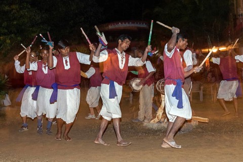 Nepalese men perform a traditional dance