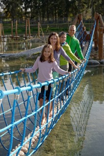 Family visiting the Erlebnispark Wasser Fisch Natur adventure park
