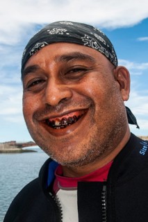 Local captain chewing betel nut