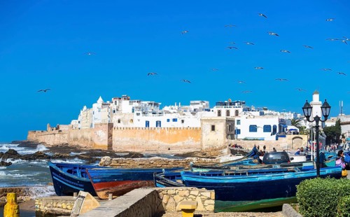 Fishing boats in front of the Sqala de la Kasbah