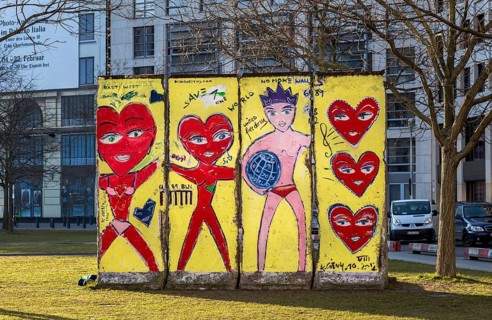 Artistically painted wall segments on the lawn at Potsdamer Platz square