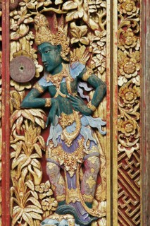 Wooden door decorated with carvings