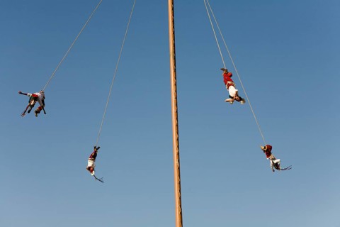 Voladores performing at a village festival