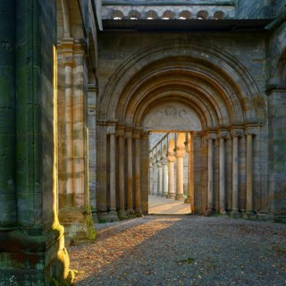 Ruins of the monastery church of Paulinzella in the morning light